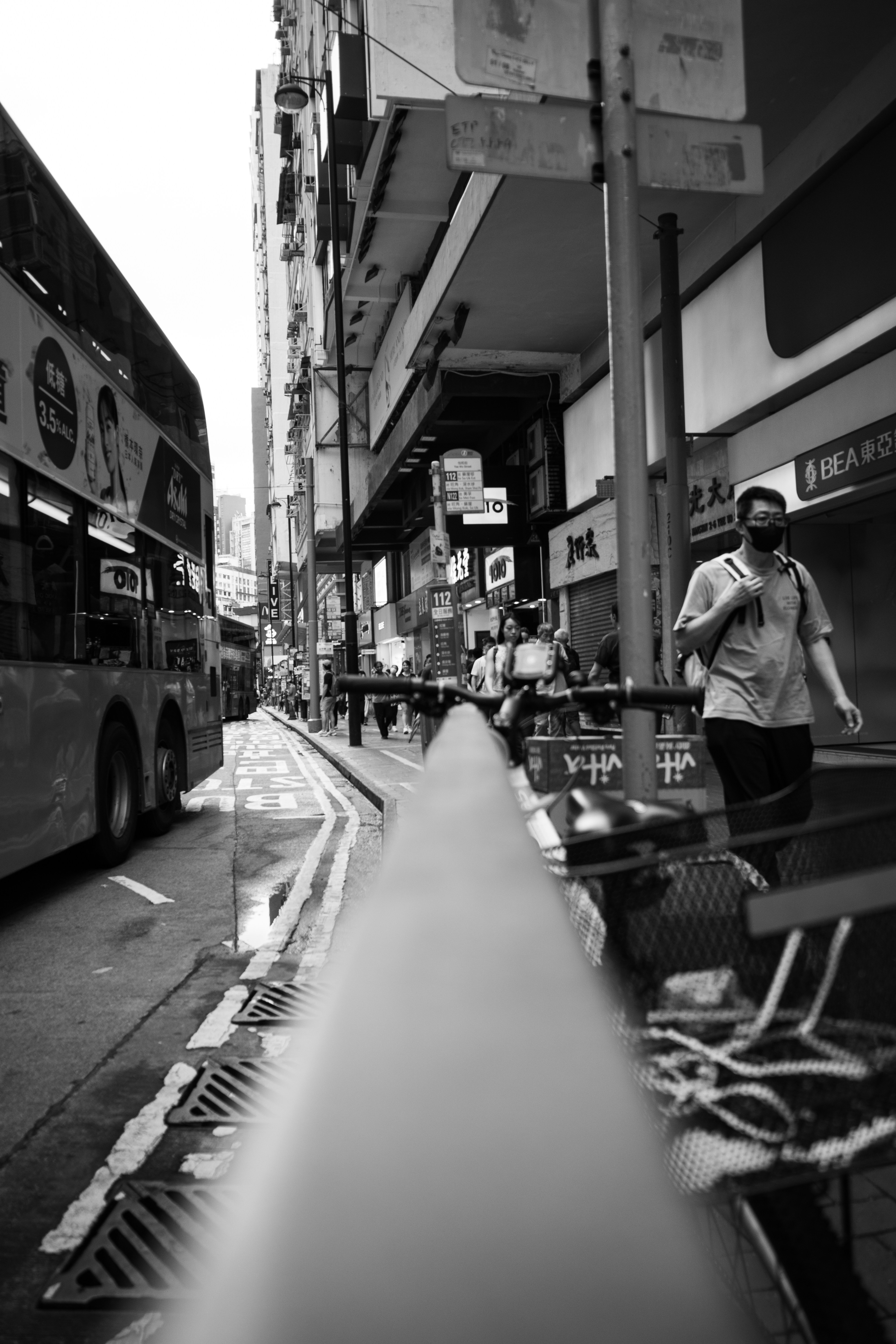 A black and white photo of a city street